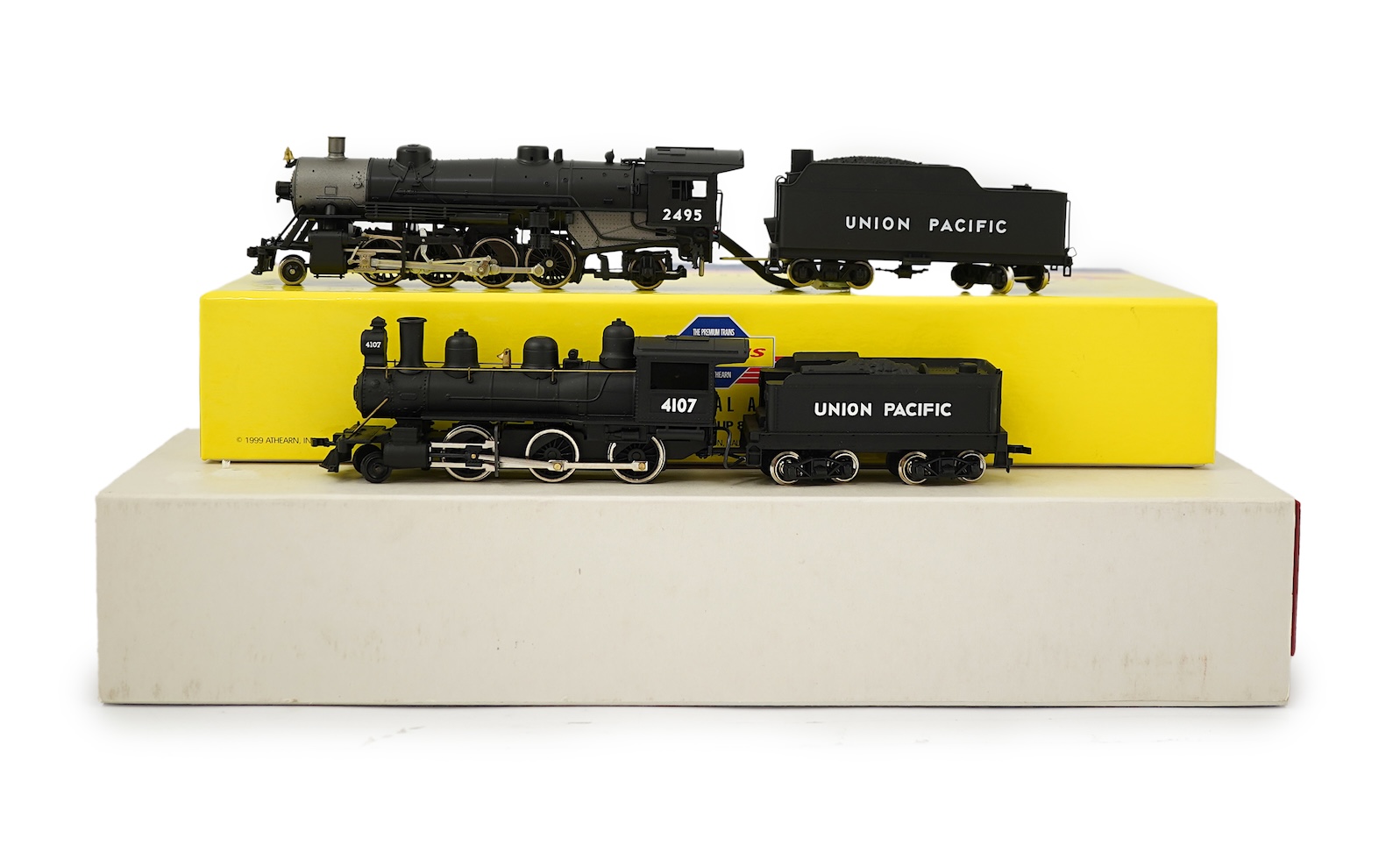 Two boxed HO gauge Union Pacific locomotives; a Genesis (G9008) model of USRA, 2495, 2-8-2 locomotive with bogie tender, together with a Mantua (313-003) 2-6-0 Mogul locomotive with bogie tender, both powered for two rai